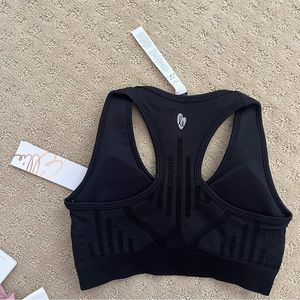 Ellie Activewear black sports bra with crochet pattern, NWT